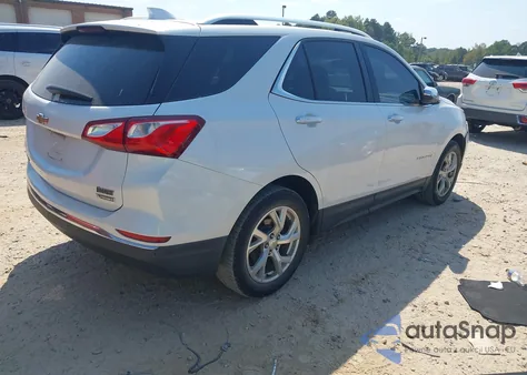 2018 Chevrolet Equinox Premier z USA, uszkodzony, nr VIN 2GNAXMEV4J6302189